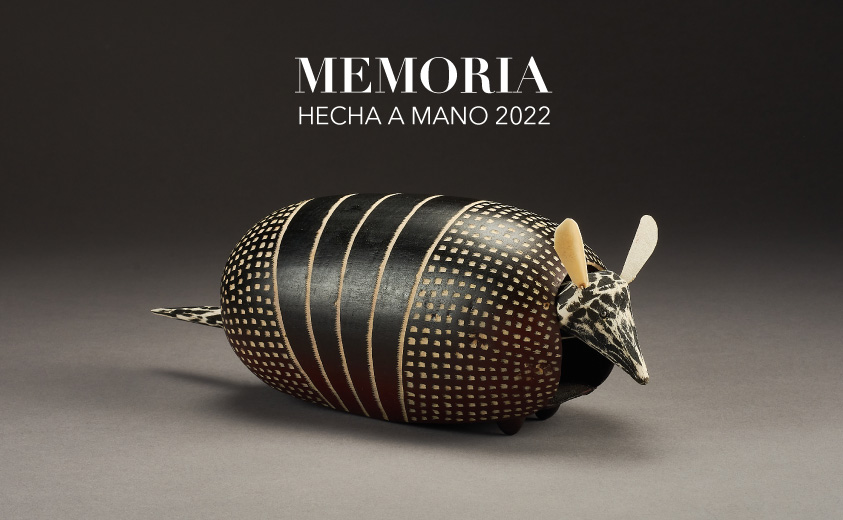 Foto de una artesanía elaborada en totumo que representa un armadillo 